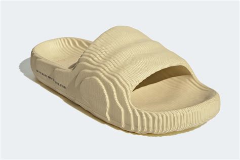 adilette slides price.